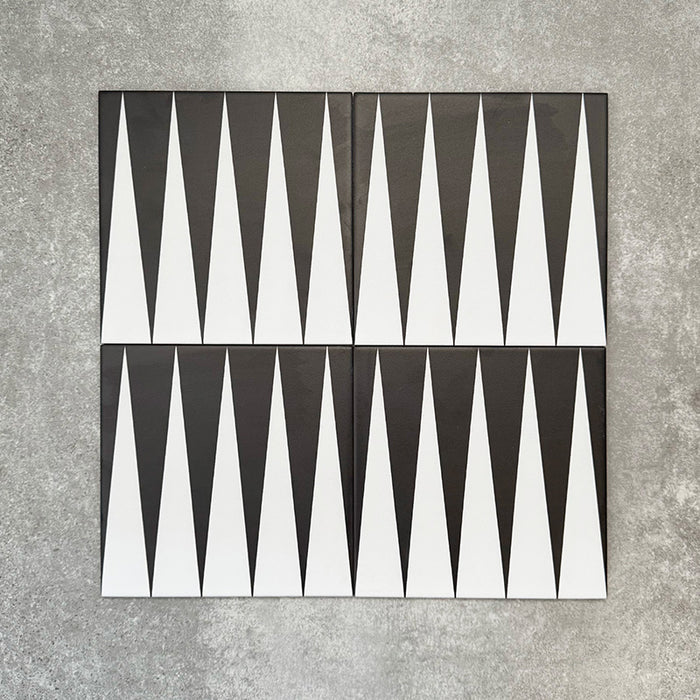 Four Almeria Backgammon Moroccan-style porcelain wall and floor tiles displayed together in a bold black and white geometric pattern, 20x20cm.
