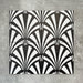 Four Almeria Casablanca Moroccan-style porcelain wall and floor tiles displayed together in a bold black and white fan pattern, 20x20cm.
