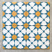 Agadir Sun and Sky Moroccan-style 20x20cm porcelain tiles arranged as four tiles, showcasing a repeating geometric star pattern in blue, white and warm yellow on a neutral background.