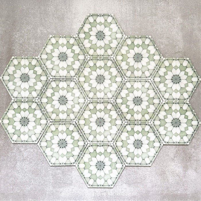 Grouped layout of Medina Soft Green Moroccan-style hexagon porcelain tiles, 18.7 × 21.6 cm, displaying the full repeating geometric pattern in soft green and white tones on a neutral background.