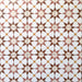 Agadir Cotto Moroccan-style 20x20cm porcelain floor tiles laid in a repeating geometric star pattern, showcasing warm terracotta, white and soft yellow tones in a coordinated tile layout.
