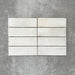 Saigon White Brick Wall tiles laid horizontally, featuring Moroccan-style 5.1 × 16.1cm glossy ceramic tiles in soft white tones with subtle tonal variation.