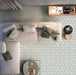 Living room featuring Medina Hormuz Sage Green/Grey Moroccan-style hexagon porcelain floor tiles, 18.7 × 21.6 cm, laid in a striking geometric pattern and styled with modern seating and soft neutral furnishings.