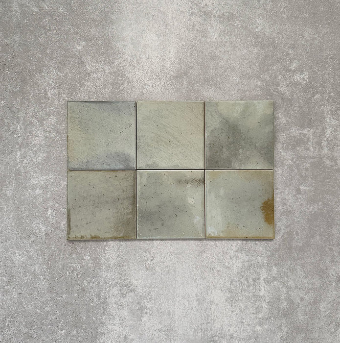 Close-up of Saigon Celadon Green Square Wall tiles in a Moroccan-inspired style, 10 × 10cm glossy ceramic tiles with soft green and blue-grey colour variation.