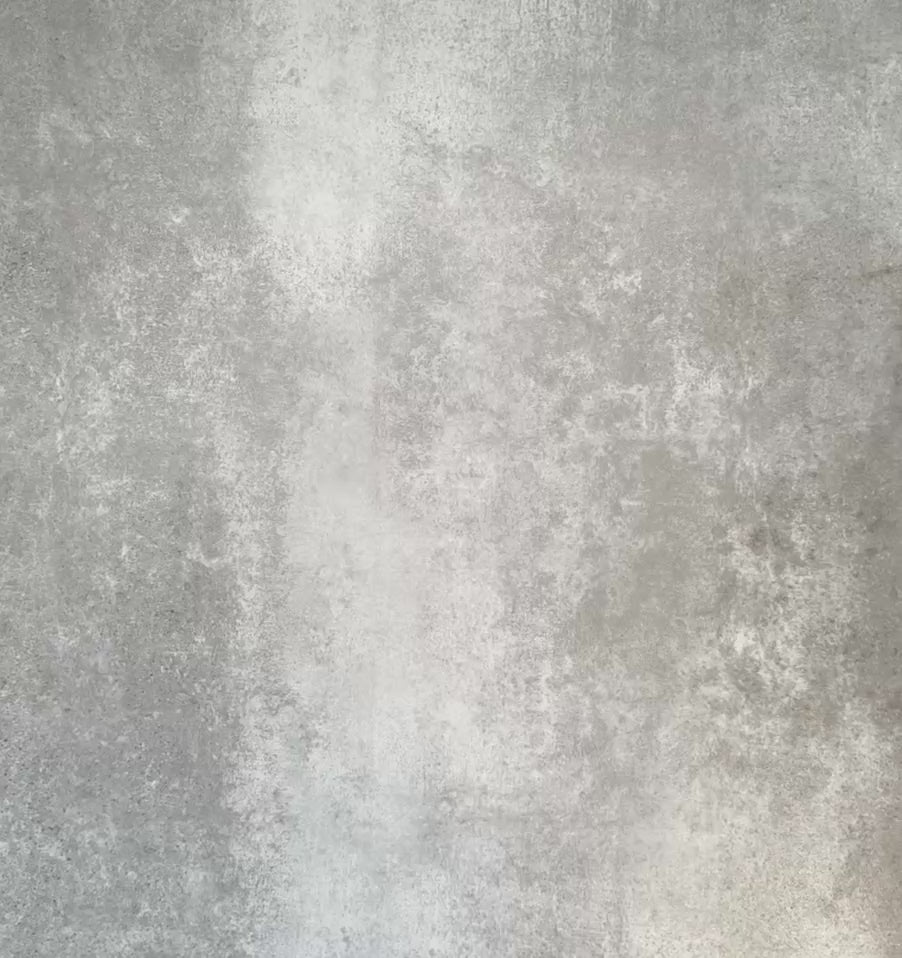 Video showing Almeira Azteca Moroccan-style porcelain tiles laid on a floor, highlighting the bold black and white geometric pattern and how the 20x20cm tiles repeat seamlessly across the space.