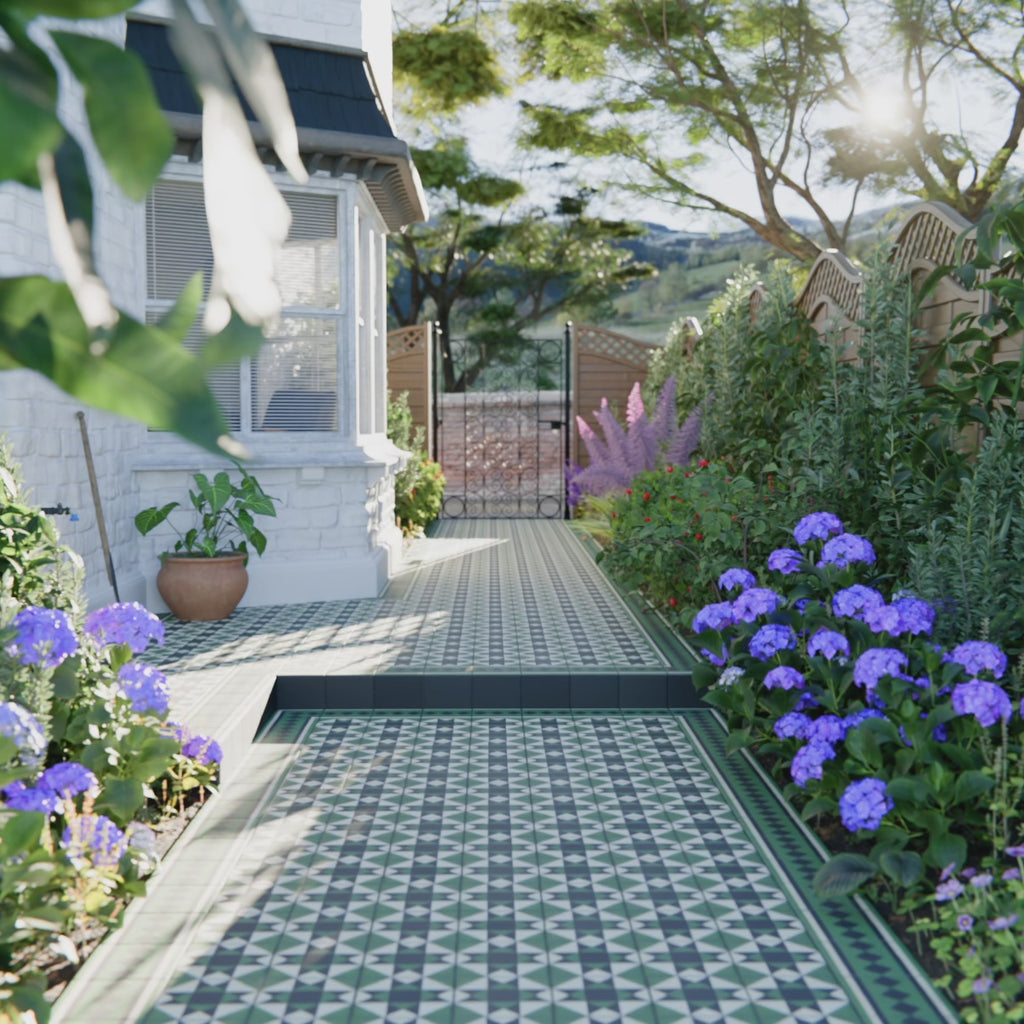 Video of Greenbrook Manor anti-slip encaustic Victorian-style porcelain tiles, featuring a classic green, black and white geometric pattern, shown installed outdoors to demonstrate the textured, slip-resistant surface and traditional Victorian design.