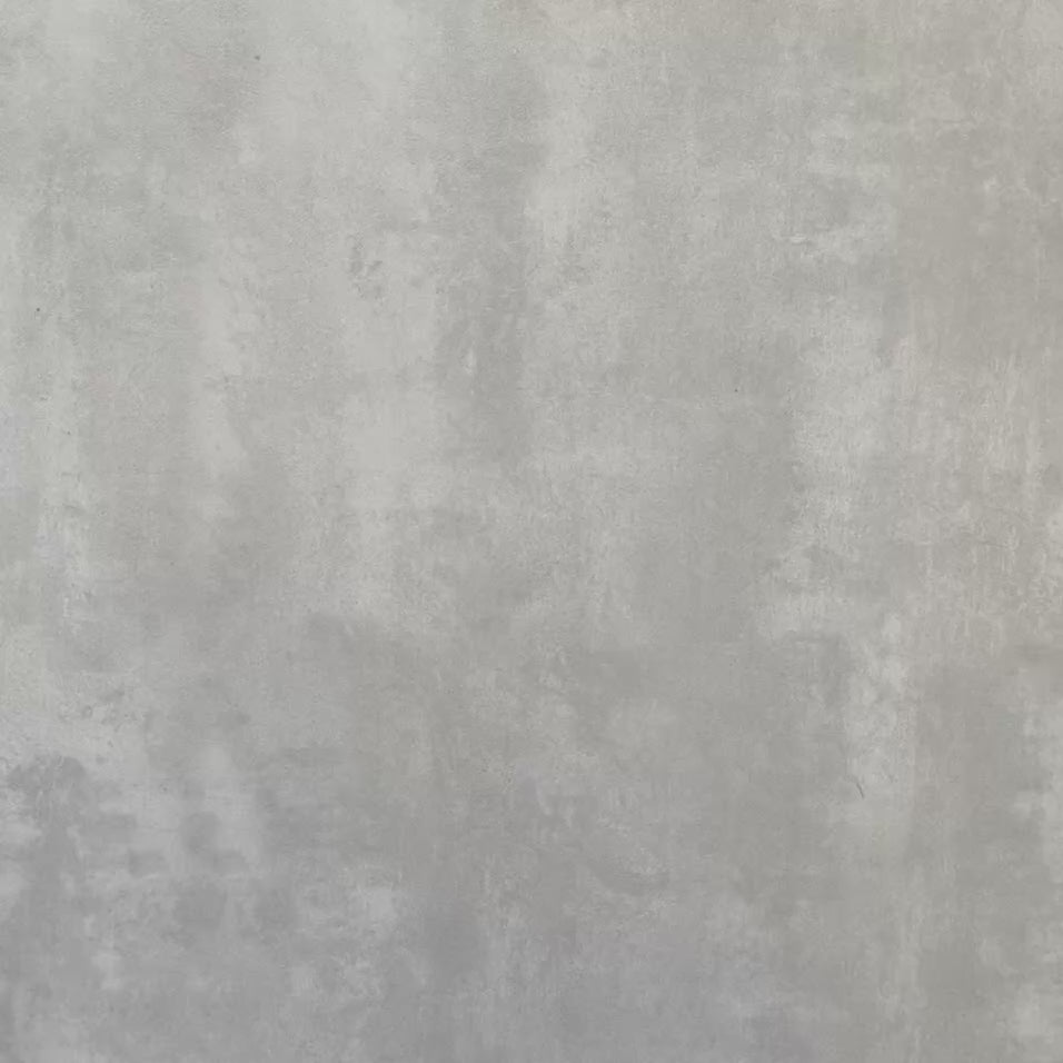 Video of Agadir Verde Moroccan-style 20x20cm porcelain tiles, showcasing the repeating geometric star pattern in green, white and charcoal as the tiles are viewed from different angles.