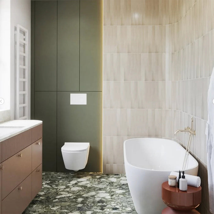 Almond Nut Matt 5x40 vertical wall tiles used in a bathroom, creating a calm, neutral backdrop with warm beige tones.
