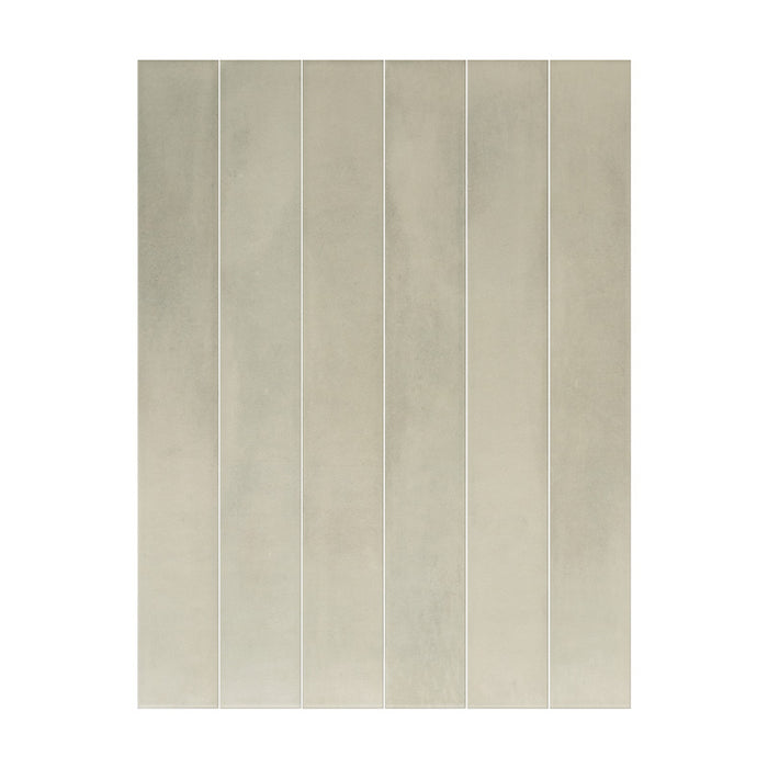 Jumairah Green 5x40 ceramic wall tiles showing soft green colour variation and subtle surface texture