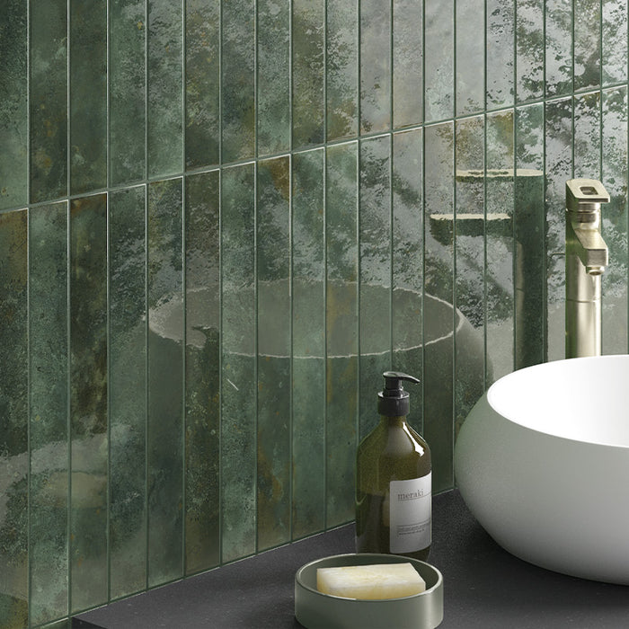 Pine Forest Green gloss wall tiles in a bathroom setting, showing vertical installation and textured green surface detail